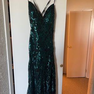 Teal Sequin Mermaid Prom dress.